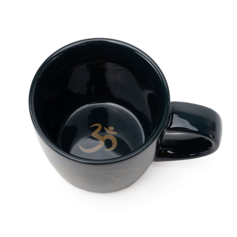 Keramisk mugg, sol och måne
